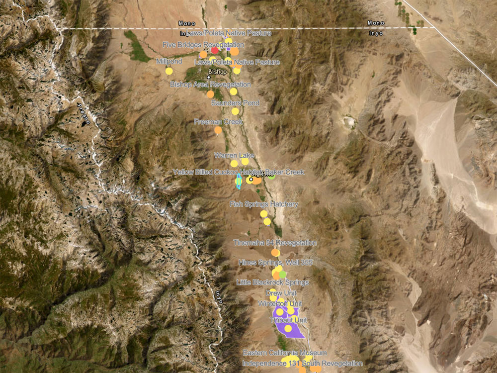 map Map showing labeled points along a mountain range, indicating various sites and locations in colored dots.